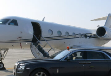 Gulfstream 405 corporate jet with an executive car.